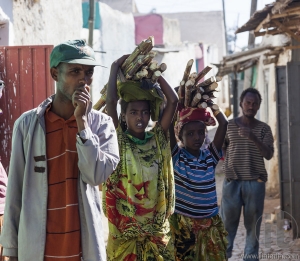 HARAR, ETHIOPIA - DECEMBER 23, 2013: Unidentified people of ancient walled city of Jugol in their daily routine activities that almost unchanged in more than four hundred years.