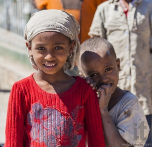HIRNA, OROMIA REGION, ETHIOPIA - DECEMBER 22, 2013: Unidentified Ethiopian children in small provincial town. Despite government efforts to fight poverty it is still widespread in Ethiopia.