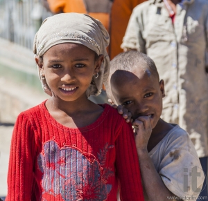 HIRNA, OROMIA REGION, ETHIOPIA - DECEMBER 22, 2013: Unidentified Ethiopian children in small provincial town. Despite government efforts to fight poverty it is still widespread in Ethiopia.