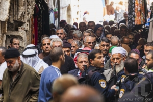 People return from Friday prayer at al aqsa mosque. Old Jerusale