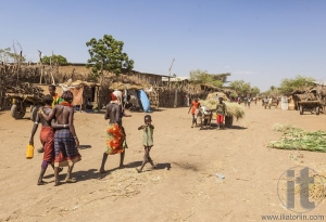 People in traditional village of Dassanech tribe. Omorato, Ethio