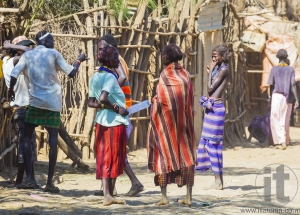 People in traditional village of Dassanech tribe. Omorato, Ethio