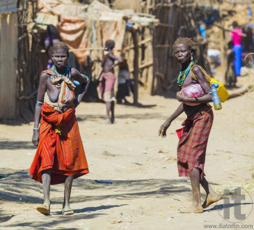 People in traditional village of Dassanech tribe. Omorato, Ethio