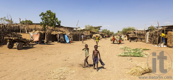 People in traditional village of Dassanech tribe. Omorato, Ethio
