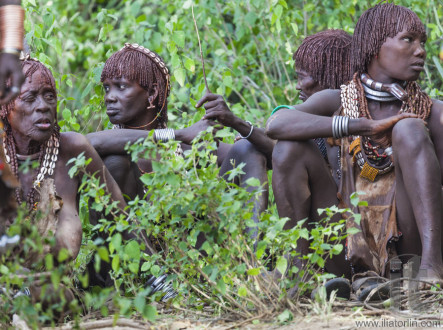 Women get ready for dancing at bull jumping ceremony.