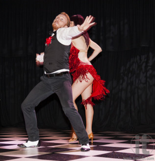 Salsa performance dancing. Casino Royal Black Tie ball. Roundhouse Kensington. Sydney. Australia.