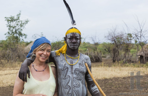 European woman and man from Mursi tribe in Mirobey village. Mago