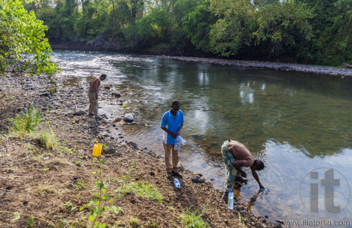 People draw water from the Mago River to bottles. Omo Valley. Et