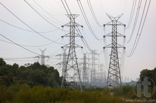 Power lines and towers on cloudy day. Melbourne. Australia.