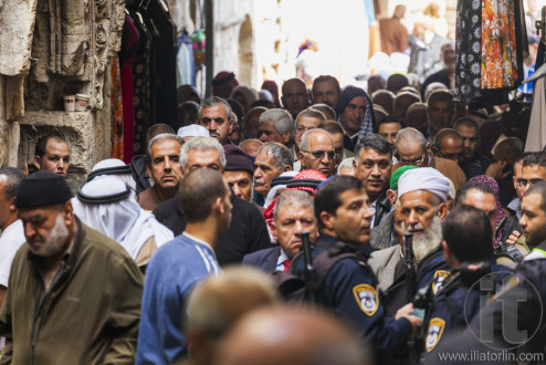 People return from Friday prayer at al aqsa mosque. Old Jerusale