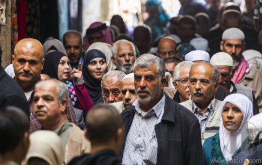 People return from Friday prayer at al aqsa mosque. Old Jerusale