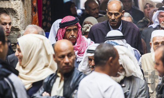 People return from Friday prayer at al aqsa mosque. Old Jerusale