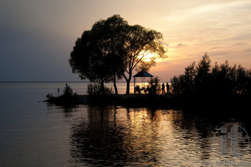 Russia. Pleshcheevo Lake.just before sunset. Pergola. Silhouettes.