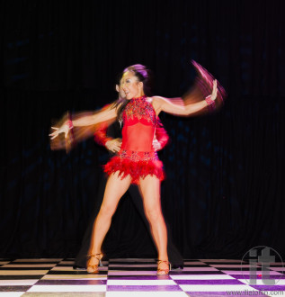 Salsa performance dancing. Casino Royal Black Tie ball. Roundhouse Kensington. Sydney. Australia.
