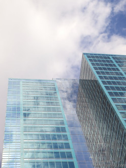 Clouds reflecting in Skyscraper in Sydney. Australia