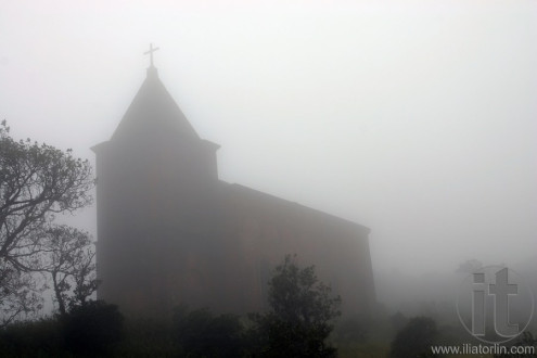 Church in fog. Bokor Hill near Kampot. Cambodia.