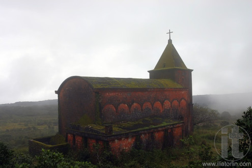 Abandoned church in foggy weather. 'Ghost town' Bokor Hill station near town of Kampot. Cambodia.