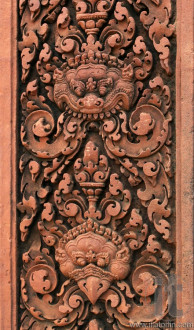 Red stone carving of the Banteay Srei Temple in the Angkor. Siem Reap, Cambodia.
