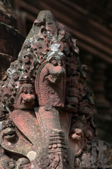 Red stone carving of the Banteay Srei Temple in the Angkor. Siem Reap, Cambodia.