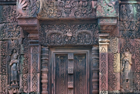 Red stone carving of the Banteay Srei Temple in the Angkor. Siem Reap, Cambodia.