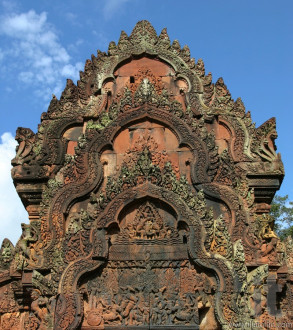 Red stone carving of the Banteay Srei Temple in the Angkor. Siem Reap, Cambodia.