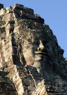 Smiling face of the king Jayavarman VII in the temple of Bayon, Angkor Wat, Siem Riep, Cambodia.