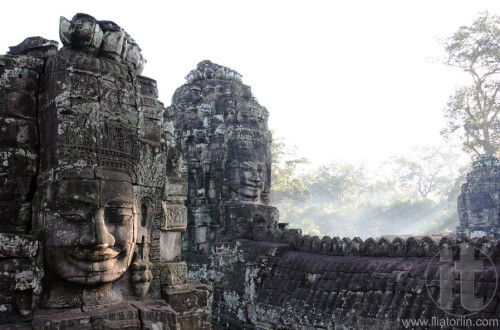 Smiling faces of the king Jayavarman VII in the Temple of Bayon (13th century) at the centre of Angkor Thom. Angkor. Siem Reap. Cambodia