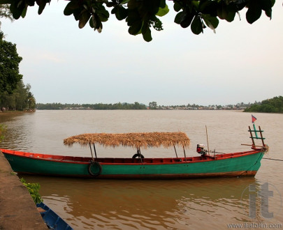 Traditional boat on Kampot river. Kampot. Cambodia.