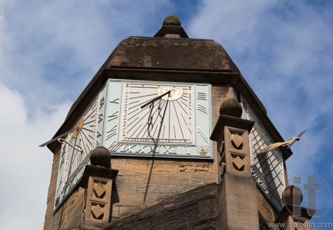 Sundial and carved stone. Cambridge. UK.