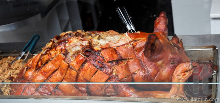 Grilled pig in the restaurant window. Edinburgh. Scotland. UK.