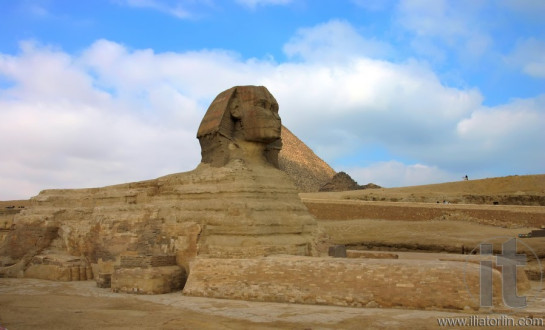 Giza sphinx with pyramids on the background. Cairo. Egypt.