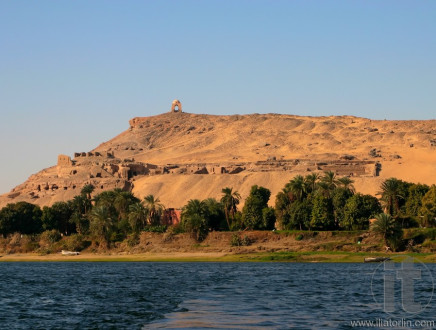 Mausoleum and ruins on Nile bank on the hill near Aswan.