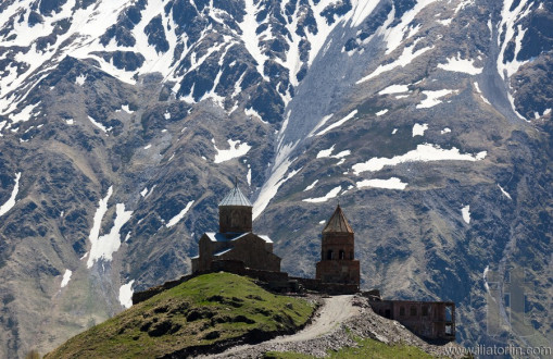 Gergeti Trinity Church and Caucasus Mountains. Stepantsminda. Georgia.