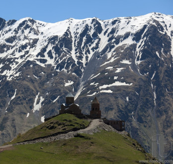 Gergeti Trinity Church and Caucasus Mountains. Stepantsminda. Georgia.