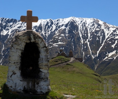 Gergeti Trinity Church and Caucasus Mountains. Stepantsminda. Georgia.