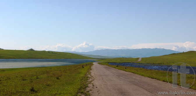 Meadows, country road and two lakes. Kakheti. Georgia.