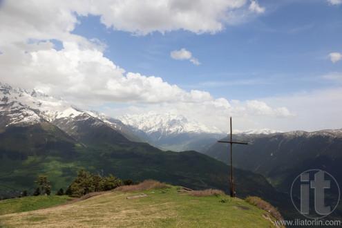 Summit marked with cross above Mestia village. Upper Svaneti. Georgia