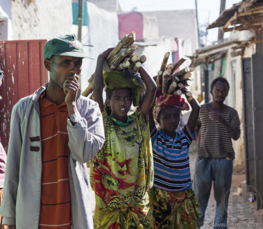 HARAR, ETHIOPIA - DECEMBER 23, 2013: Unidentified people of ancient walled city of Jugol in their daily routine activities that almost unchanged in more than four hundred years.