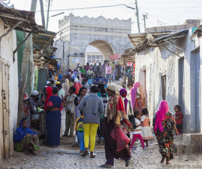 HARAR, ETHIOPIA - DECEMBER 23, 2013: Unidentified people of ancient walled city of Jugol in their daily routine activities that almost unchanged in more than four hundred years.