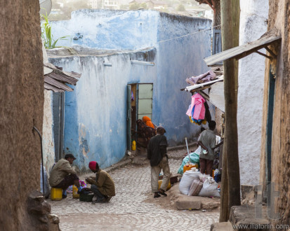 HARAR, ETHIOPIA - DECEMBER 23, 2013: Unidentified people of ancient walled city of Jugol in their daily routine activities that almost unchanged in more than four hundred years.