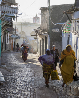 HARAR, ETHIOPIA - DECEMBER 23, 2013: Unidentified people of ancient walled city of Jugol in their morning routine activities that almost unchanged in more than four hundred years.