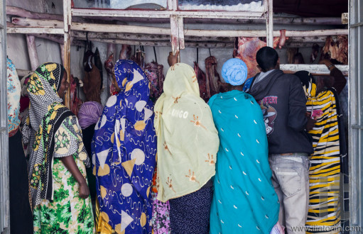 HARAR. ETHIOPIA - DECEMBER 23, 2013: Unidentified traditionally dressed women in butchery in ancient city of Jugol.