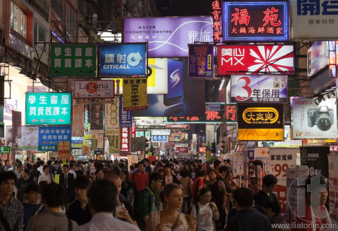 Busy street market at Night. Hong Kong.