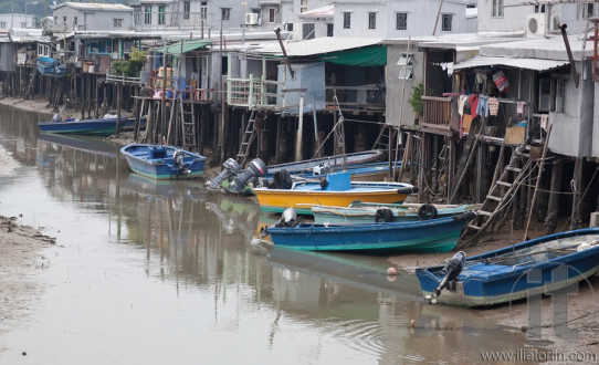 Tin houses and small boats of Tai O fishing Village. Hong Kong.