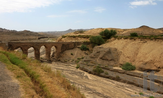Aqueduct (qanat) in deserted village of Kharanaq near Yazd. Iran