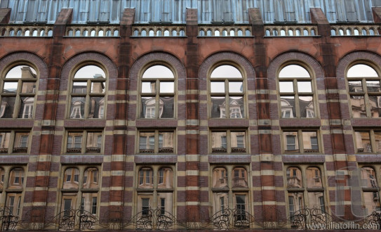 Reflections. One of the old buildings in centre of London. UK.