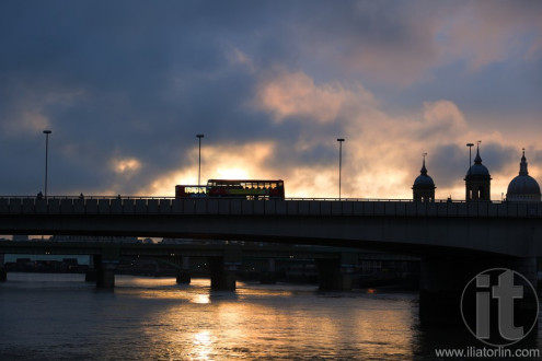 Two red double deckers buses on the bridge. London. UK.