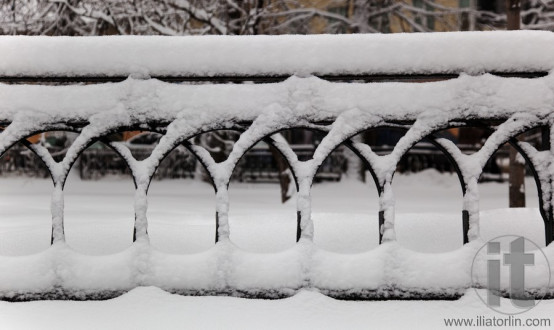 Fence in one of Moscow's boulevards after a heavy snowfall. Russia.