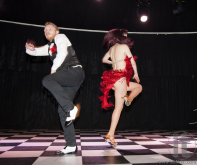 Salsa performance dancing. Casino Royal Black Tie ball. Roundhouse Kensington. Sydney. Australia.