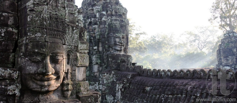 Smiling faces of the king Jayavarman VII in the Temple of Bayon.